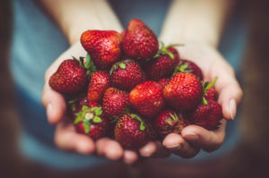 hands strawberries